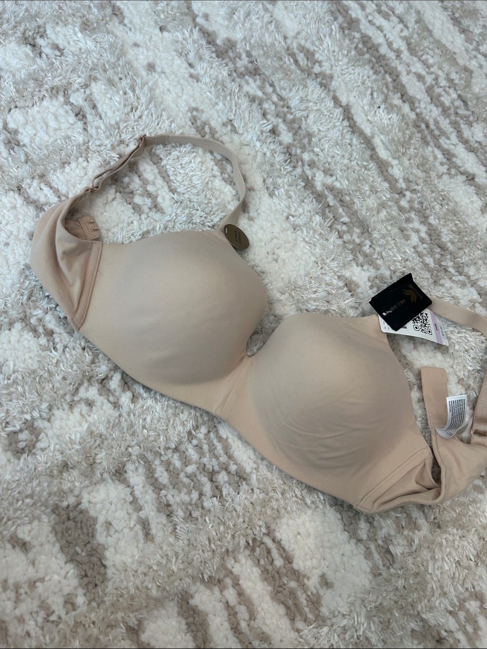 nude Wacoal wire-free t-shirt bra featuring smooth molded cups and adjustable st
